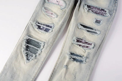 Stylish men's ripped jeans in light blue, featuring a unique distressed look and skinny-fit silhouette inspired by New Zealand's high-street fashion