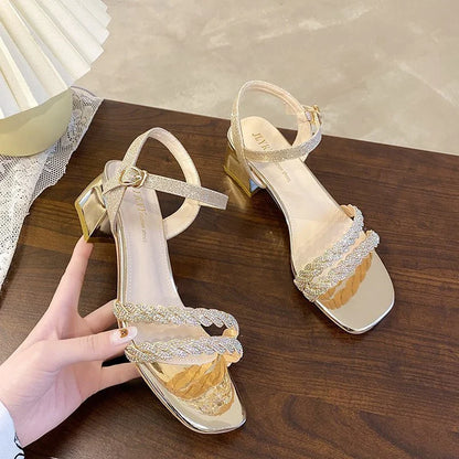 Stylish high-heeled sandals with thick soles in silver and gold colors, perfect for fashionable women in New Zealand.