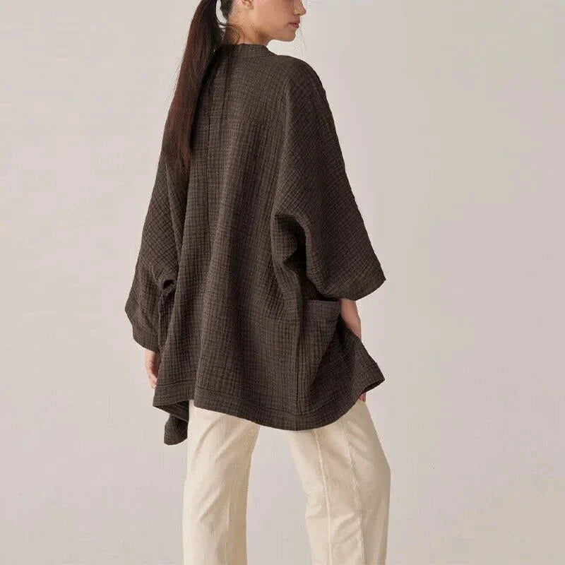 Stylish Kiwi cotton cardigan with chic open-knit design, perfect for transitional weather and everyday wear in New Zealand