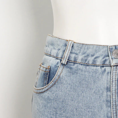 Wide-leg denim pants in classic blue, featuring a high-waisted, flattering silhouette and slightly elastic waistband for Kiwi-cool comfort and style.