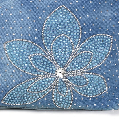 Light blue denim crossbody bag with a v-shaped diamond flower design, perfect for everyday use.