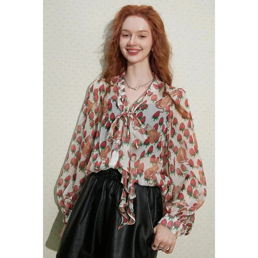 Vibrant floral chiffon blouse with stylish lantern sleeves, perfect for casual and semi-formal occasions