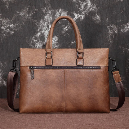 A stylish leather laptop bag featuring a classic Kiwi-inspired design, with a hidden zipper compartment, mobile phone pocket, and ID sleeve for optimal organization.