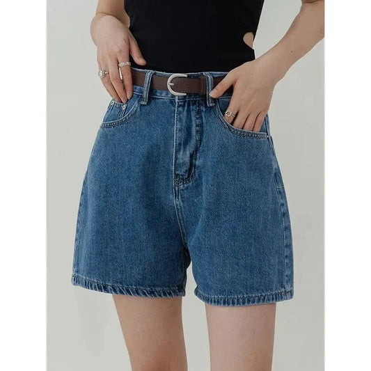 Casual high-waisted denim shorts in a chic blue hue, perfect for kiwi summer style