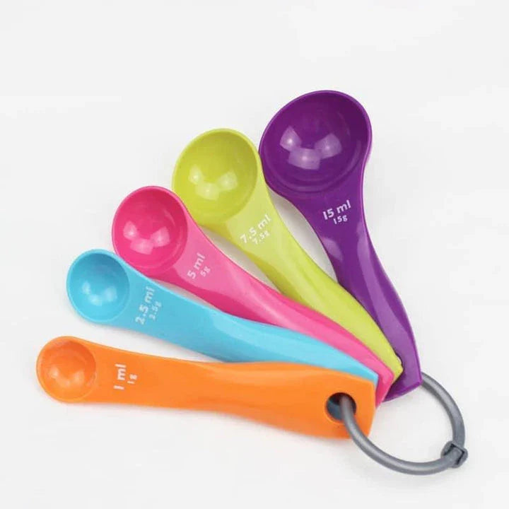 A set of colorful, eco-friendly measuring spoons with clear markings for accurate ingredient measurement