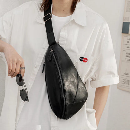 Versatile outdoor satchel in black, with multiple pockets and adjustable shoulder strap, perfect for Kiwi adventures