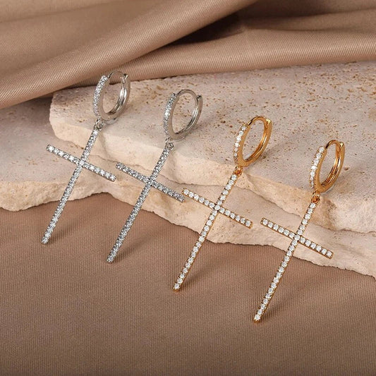 Elegant cross-shaped dangle earrings made with premium cubic zirconia and copper