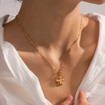 18K gold plated starfish pendant necklace with tarnish-proof stainless steel construction for timeless seaside elegance