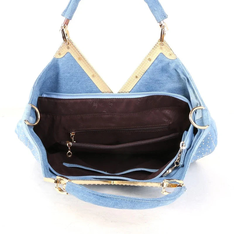 Light blue denim crossbody bag with a v-shaped diamond flower design, perfect for everyday use.