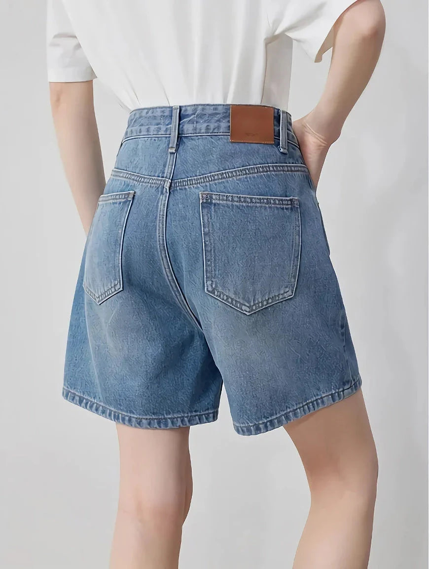 High-waisted denim shorts for women, featuring a straight-leg cut, practical pockets, and premium cotton construction for durability and comfort.