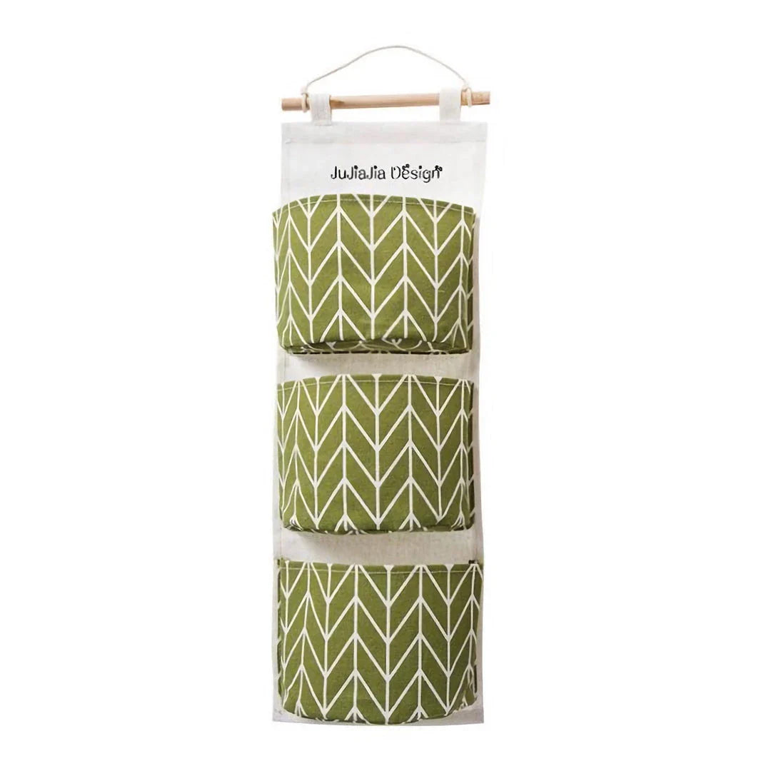 Versatile Hanging Organiser in green colour, featuring three storage pockets for tidy and organised home storage