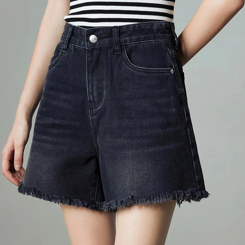 Premium high-waisted denim shorts with playful tassel detailing, perfect for summer outings in New Zealand