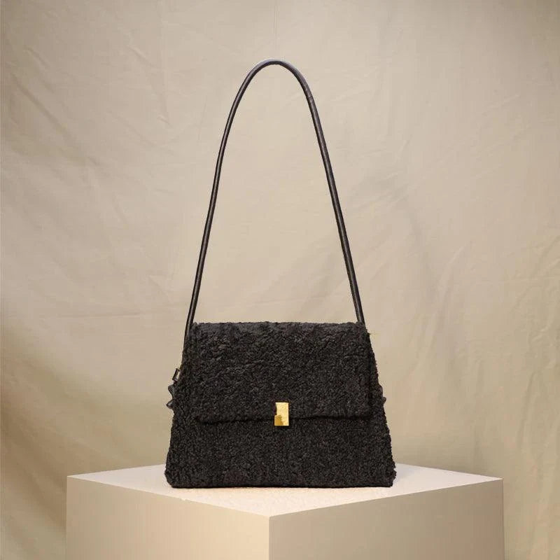 A stylish crossbody bag made from premium faux lamb wool, perfect for staying warm and chic during the New Zealand winter.