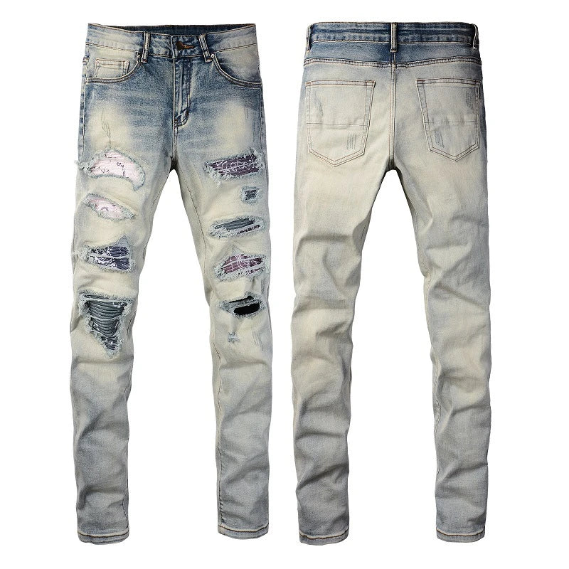 Stylish men's ripped jeans in light blue, featuring a unique distressed look and skinny-fit silhouette inspired by New Zealand's high-street fashion