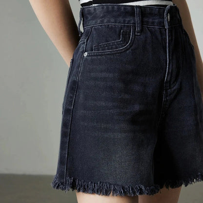 Premium high-waisted denim shorts with playful tassel detailing, perfect for summer outings in New Zealand