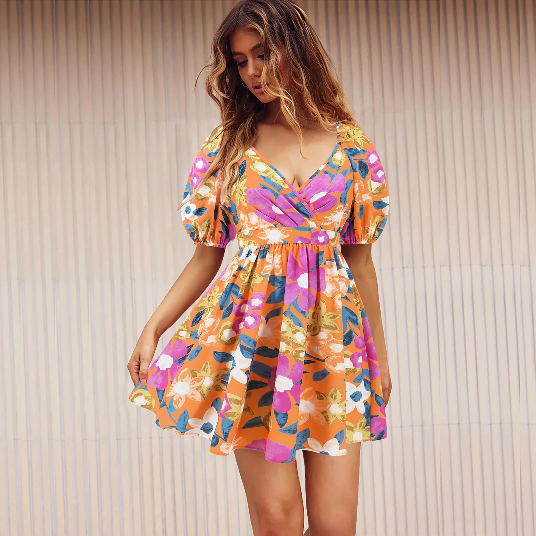 Floral print Y2K summer beach dress with lantern sleeves, v-neck, and stretchy waistline