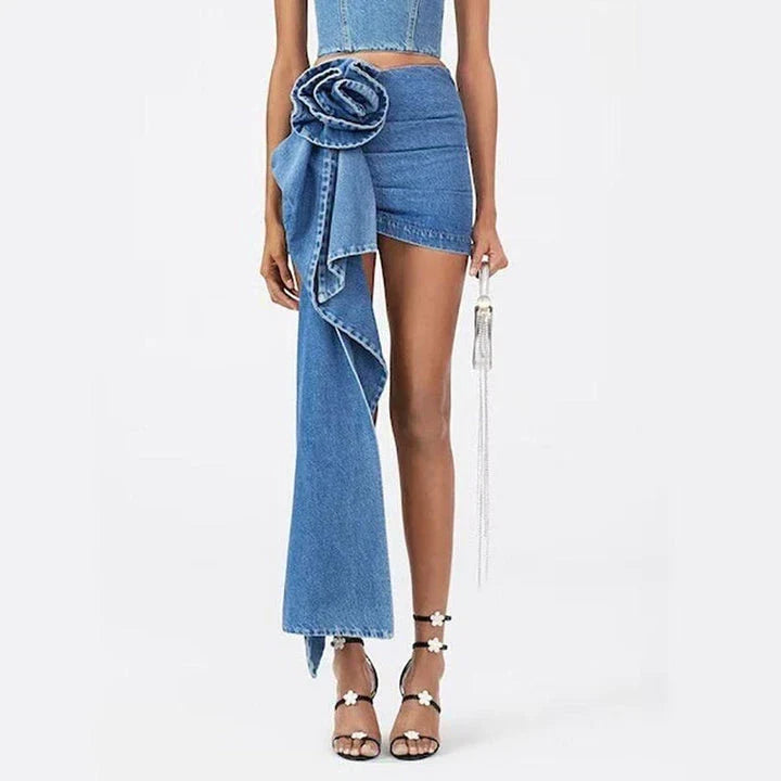 Stylish high-waisted blue denim skirt with a 3D rose detail, perfect for summer fashion