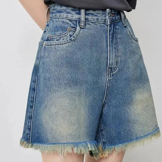 Premium high-waisted denim shorts with playful tassel detailing, perfect for summer outings in New Zealand