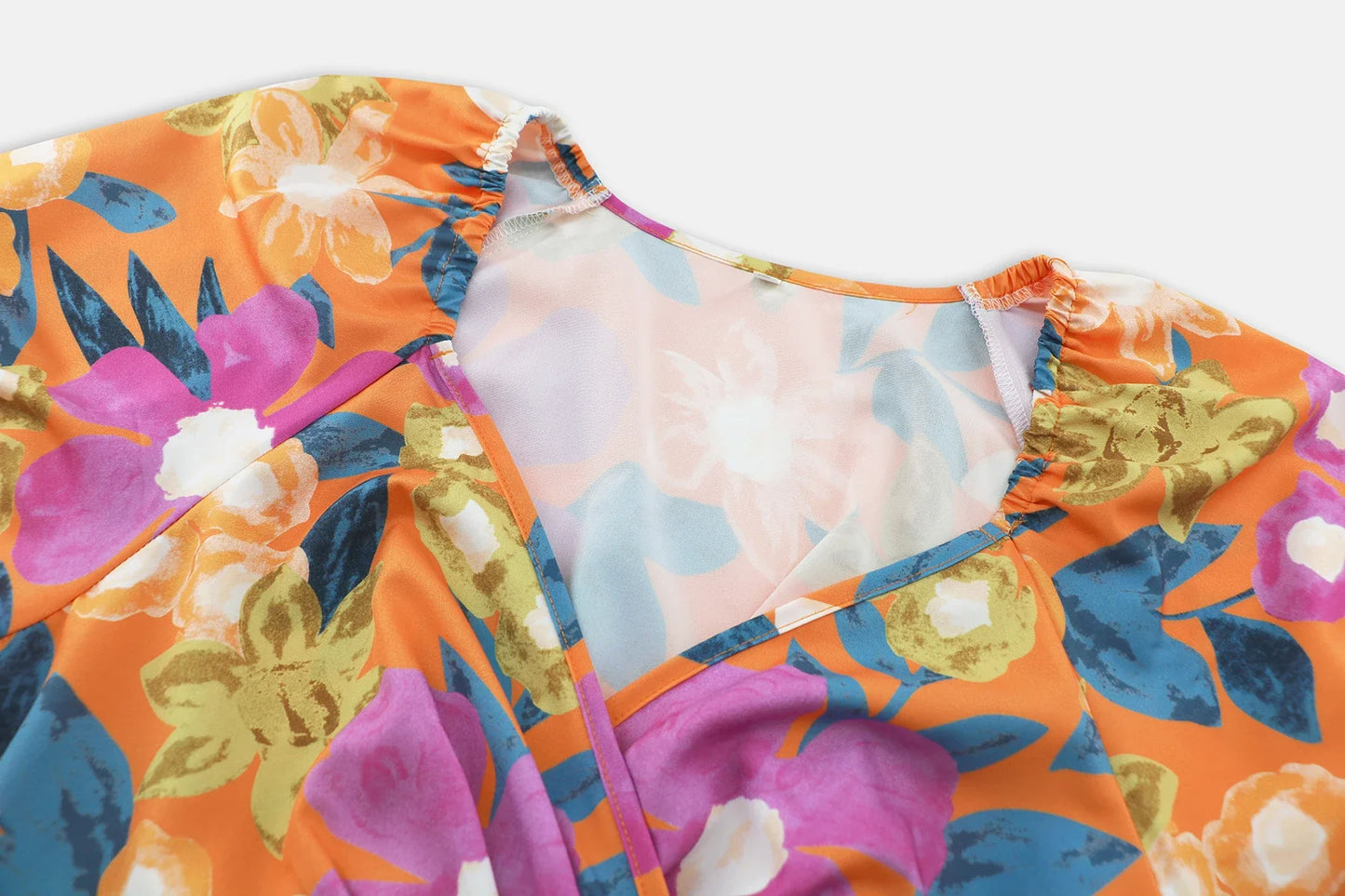 Floral print Y2K summer beach dress with lantern sleeves, v-neck, and stretchy waistline