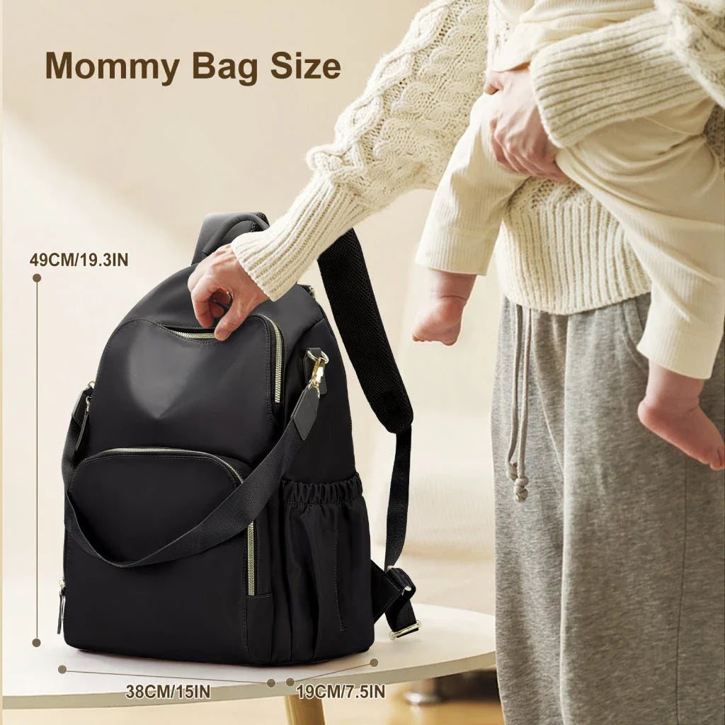 Versatile baby nappy bag backpack with multiple pockets, insulated bottle holders, and comfortable straps for busy Kiwi parents