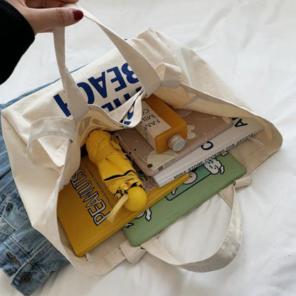 Eco-Friendly Large Canvas Shoulder Bag with Chic Letter Design and Durable Construction