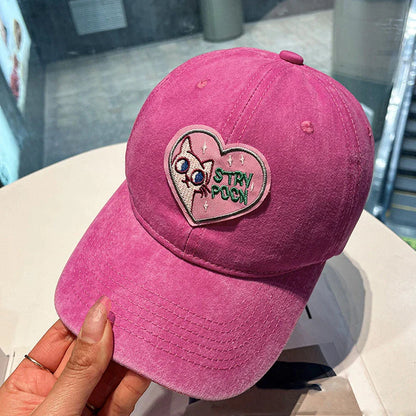 Two pink baseball caps with a cartoon love design, perfect for adding personality to your outfit.