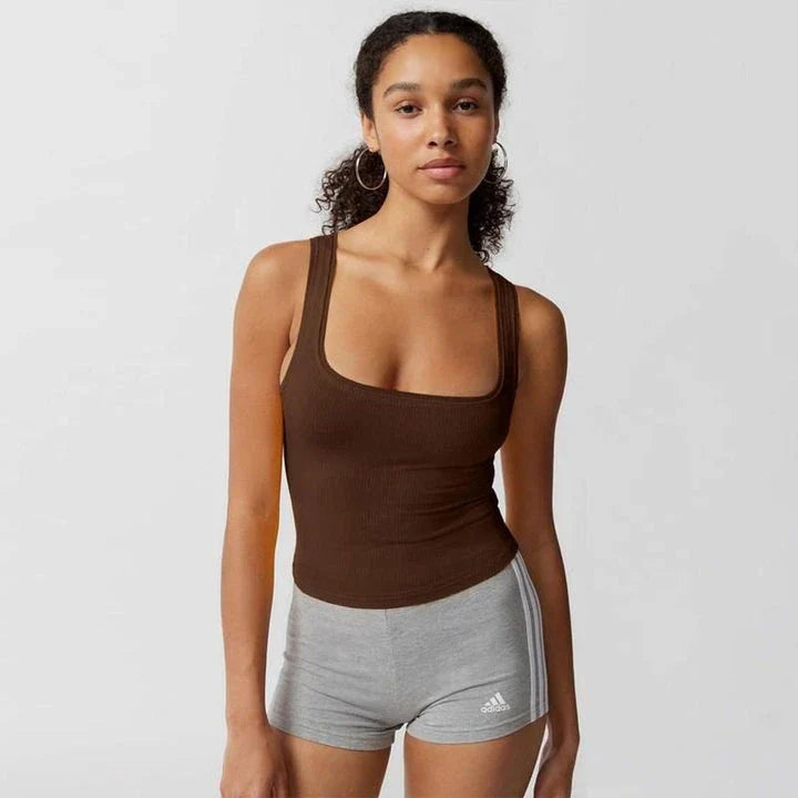 A stylish knitted sleeveless crop top in a solid brown color, perfect for Kiwi summer fashion.