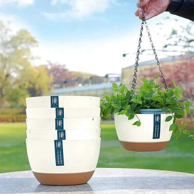 A set of modern, durable hanging flower pots in a natural, uncoated finish for indoor or outdoor use