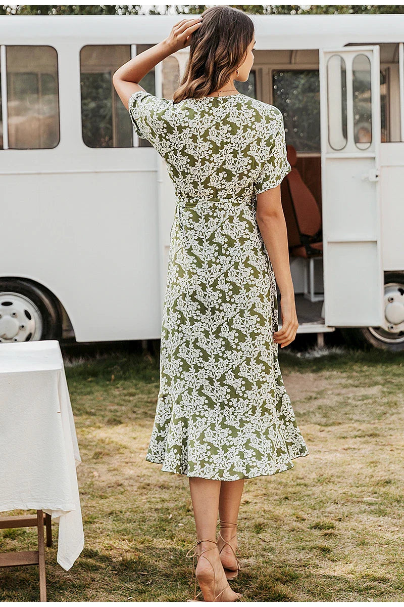 A stylish yellow printed lace ruffle dress with a flattering silhouette, perfect for Kiwi occasions.