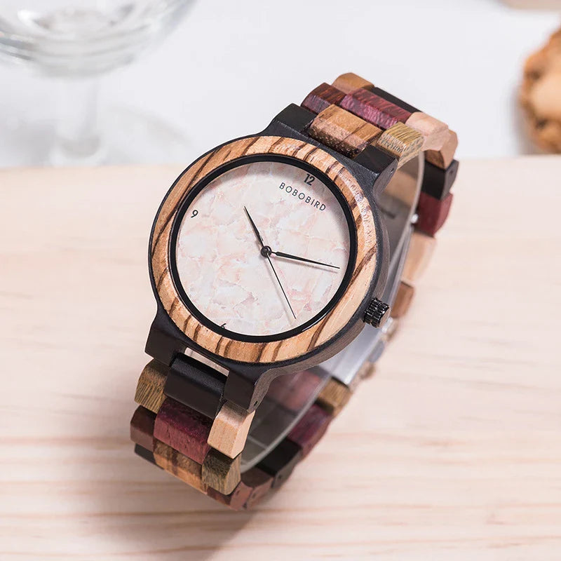 A close-up view of a stylish wooden watch with a minimalist design, showcasing the natural beauty of the wood material.