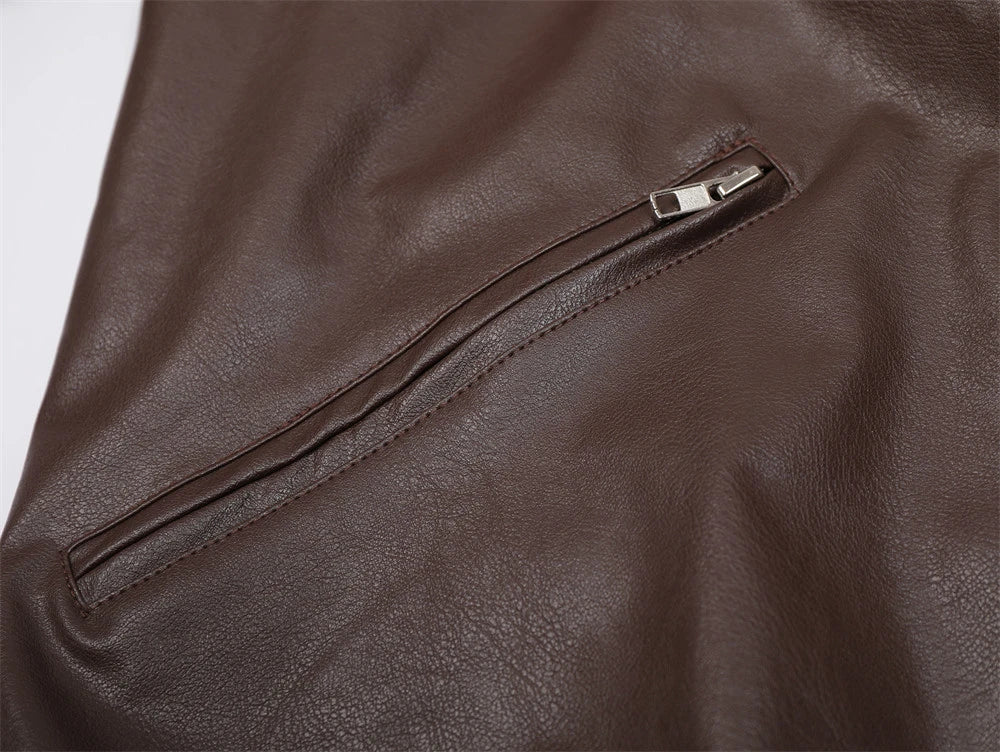 A sleek and stylish leather jacket made from premium New Zealand leather, featuring a smooth zipper closure for easy wear and a tailored fit.