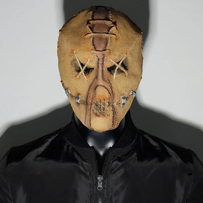 A lifelike, terrifying Halloween horror latex mask with a bleeding sack skull design