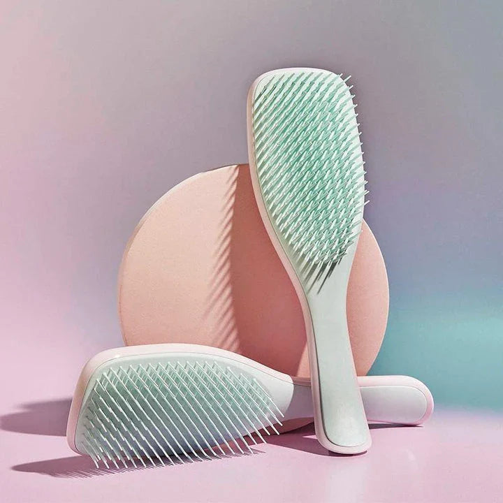 The Ultimate Anti-static Tangle-Free Detangling Hair Brush with its advanced anti-static technology and tangle-free design for effortless, frizz-free styling