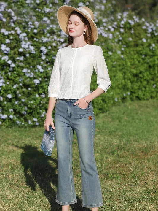 Elegant French-inspired white puff sleeve blouse with tailored fit and timeless design