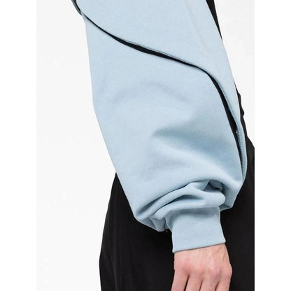 Stylish hooded sweatshirt with open sleeve design and asymmetrical detailing, available in blue and black colors