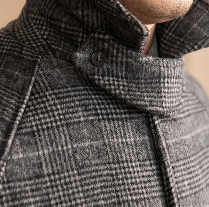 Warm and cosy wool mid-length jacket for Kiwi men, featuring a classic lapel collar and single-breasted design