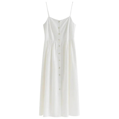 Sustainable Cozy Cotton and Linen Vacation Dress in a mid-calf length with a flattering empire waistline and spaghetti straps, perfect for Kiwi summers.