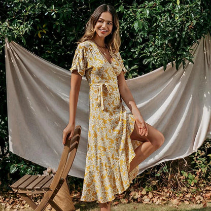 A stylish yellow printed lace ruffle dress with a flattering silhouette, perfect for Kiwi occasions.