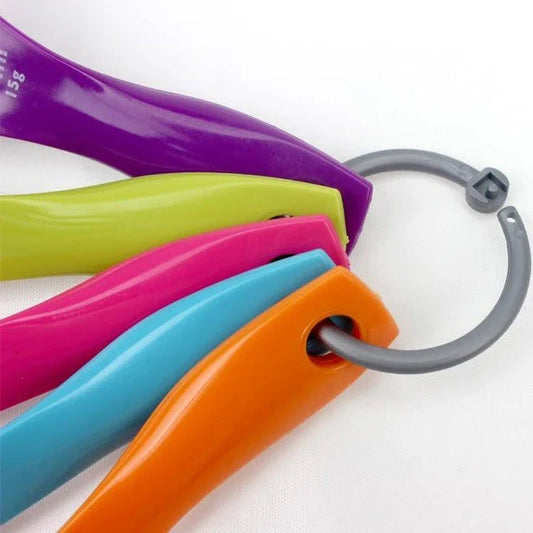 A set of colorful, eco-friendly measuring spoons with clear markings for accurate ingredient measurement