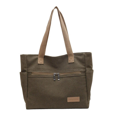 Trendha premium canvas shoulder bags in a range of classic colours, featuring a spacious main compartment and multiple internal pockets for ultimate organization and convenience.