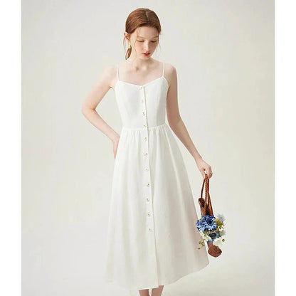 Sustainable Cozy Cotton and Linen Vacation Dress in a mid-calf length with a flattering empire waistline and spaghetti straps, perfect for Kiwi summers.