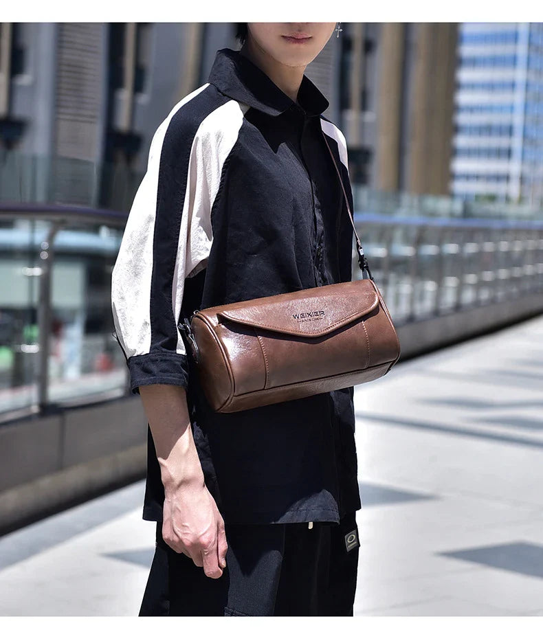 Versatile men's crossbody bag in black and brown colors with adjustable strap and multiple compartments for everyday use