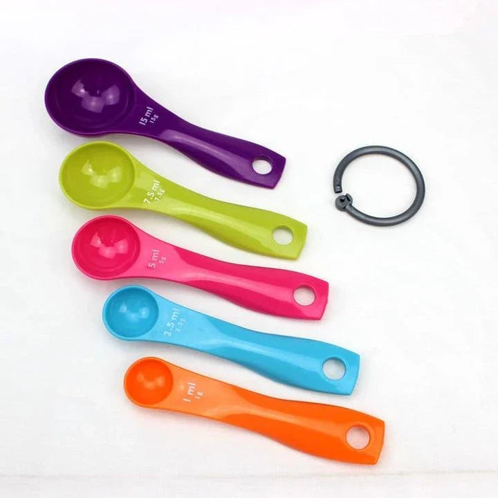 A set of colorful, eco-friendly measuring spoons with clear markings for accurate ingredient measurement