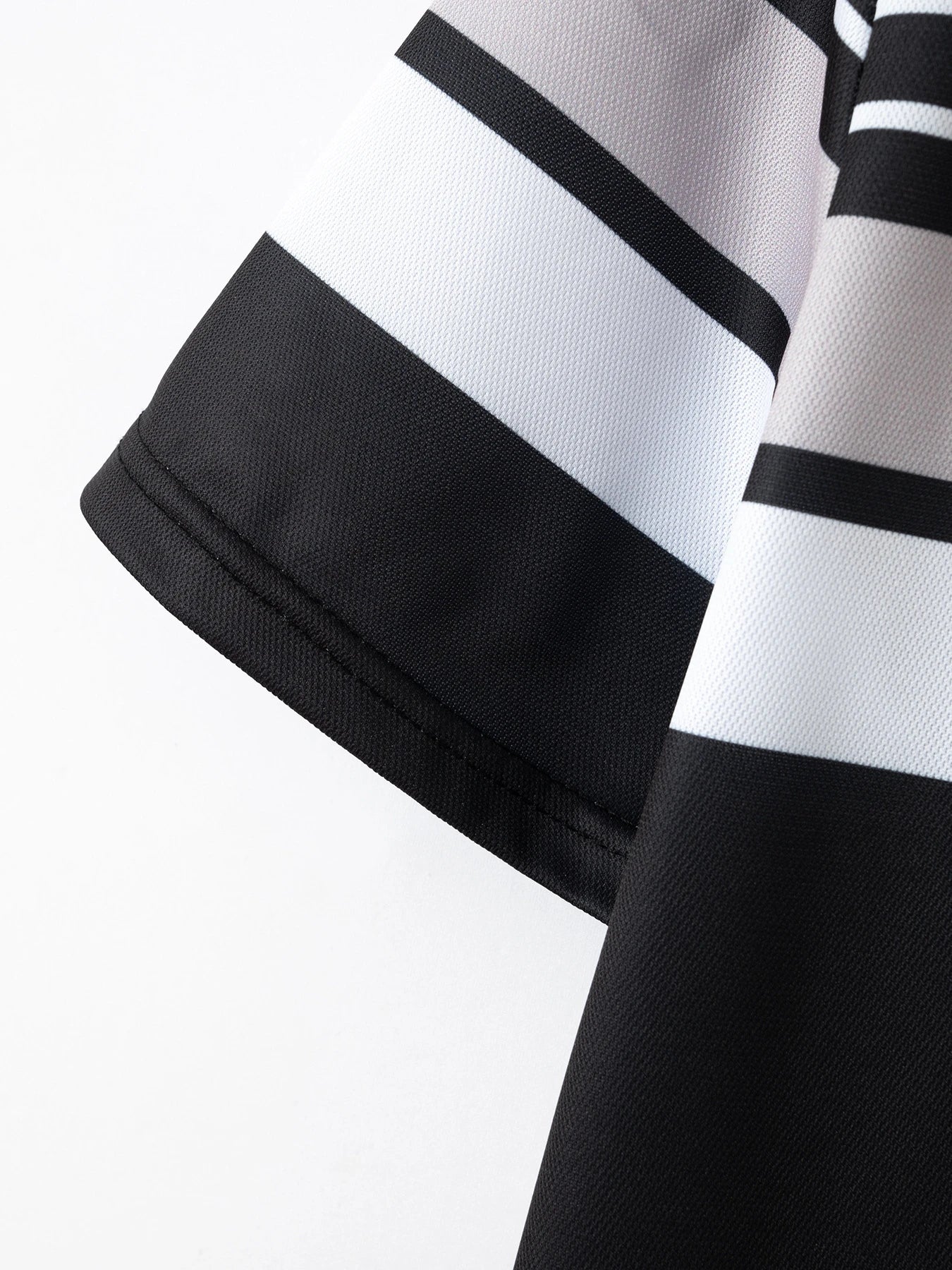 Versatile striped t-shirt in black, a premium Kiwi-made casual essential with a relaxed, comfortable fit