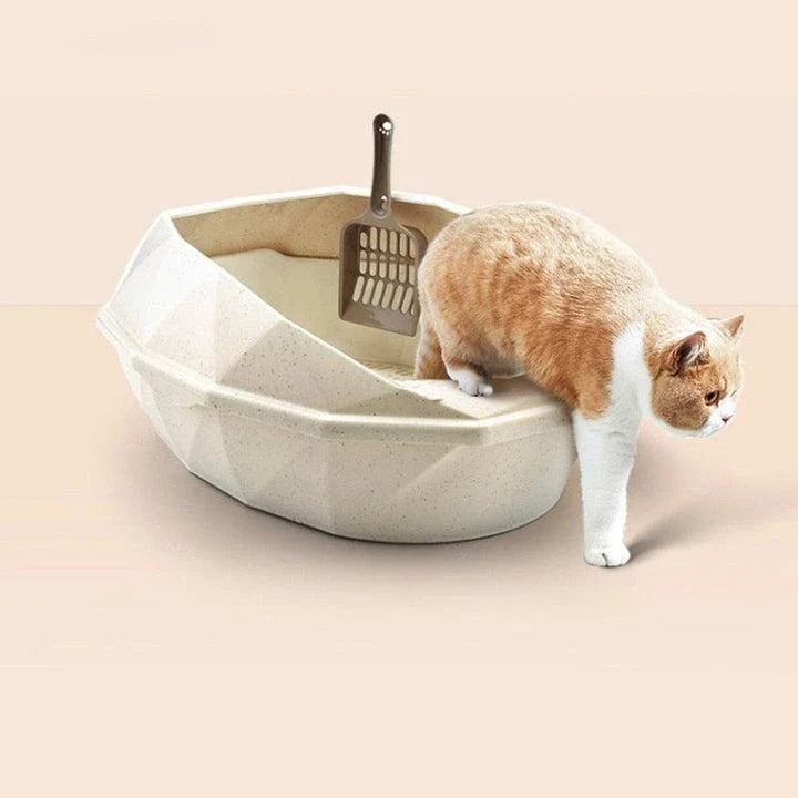 Stylish and functional crystal-shaped cat toilet with semi-enclosed design for odour control and easy cleaning