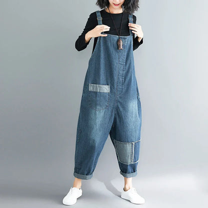 Premium, distressed denim overalls with a high-waisted fit and nine-inch leg length, designed for the modern Kiwi woman