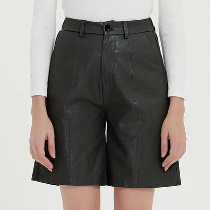 Stylish knee-length PU leather shorts for Kiwi women, featuring a flattering mid-rise waist and elastic waistband for maximum comfort.