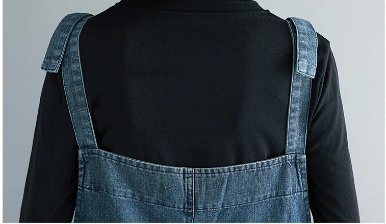 Premium, distressed denim overalls with a high-waisted fit and nine-inch leg length, designed for the modern Kiwi woman