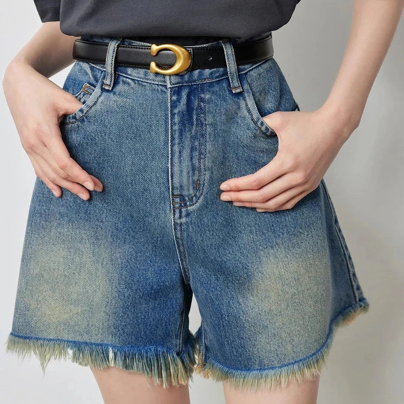 Premium high-waisted denim shorts with playful tassel detailing, perfect for summer outings in New Zealand