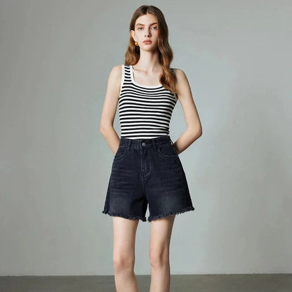 Premium high-waisted denim shorts with playful tassel detailing, perfect for summer outings in New Zealand